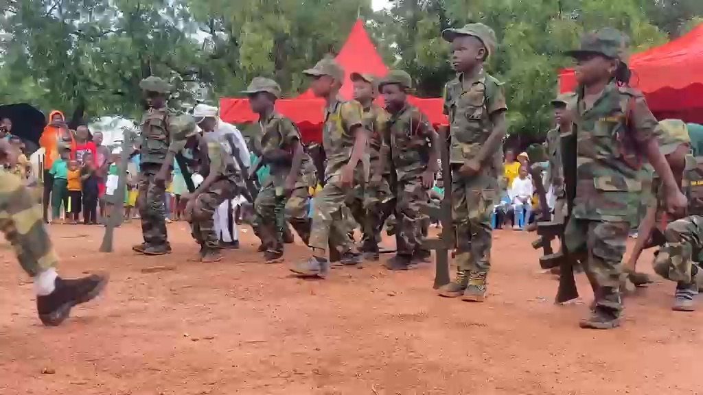 Learners in military costumes standing in formation during Career Week